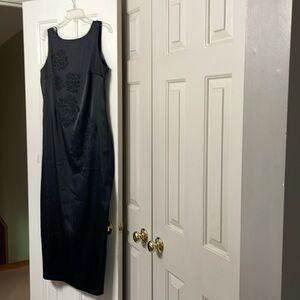 Black sleeveless long dress with beaded embroidery front of dress